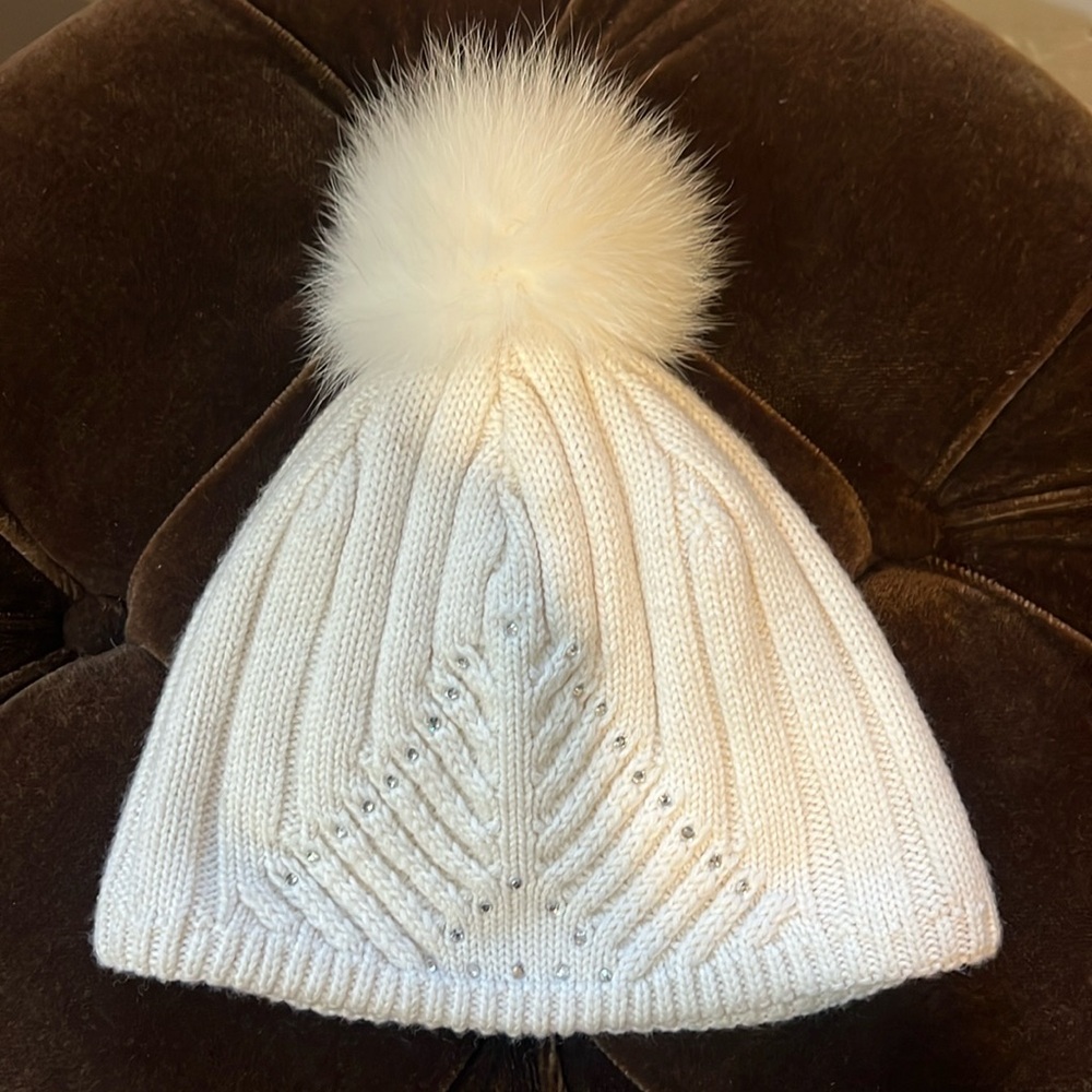 Beautiful crystal embellished cream winter hat.